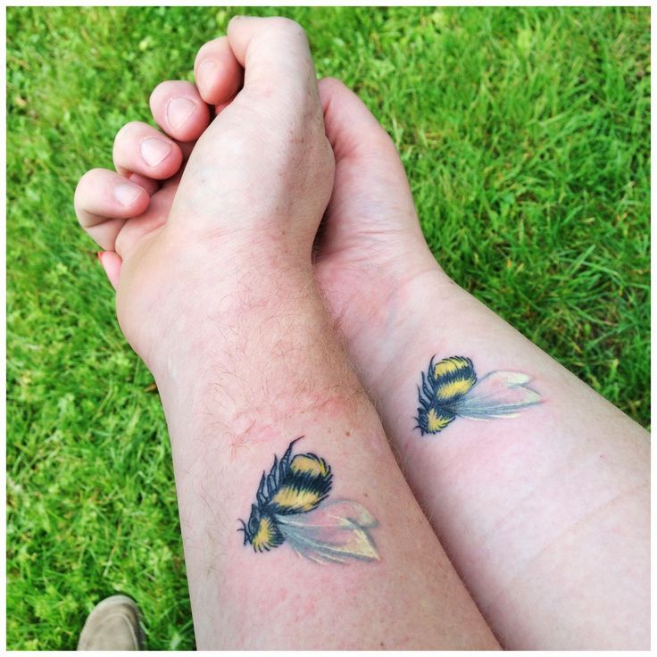 Awesome Bumblebee Tattoo On Couple Wrist By Nicky Lang