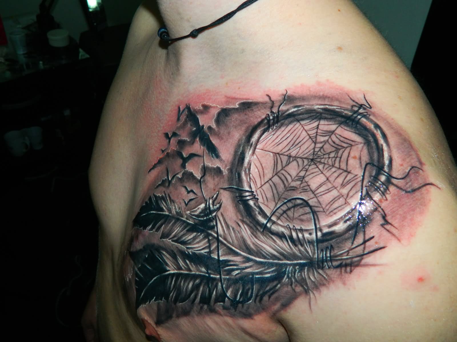 Awesome Grey Ink Dreamcatcher Tattoo On Man Collarbone