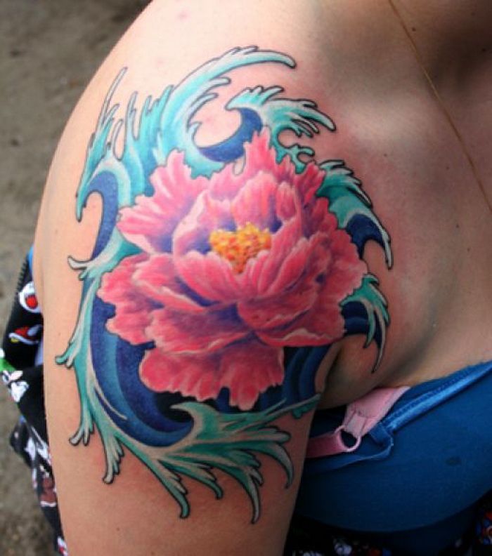 Awesome Pink Flower In Water Tattoo On Right Shoulder