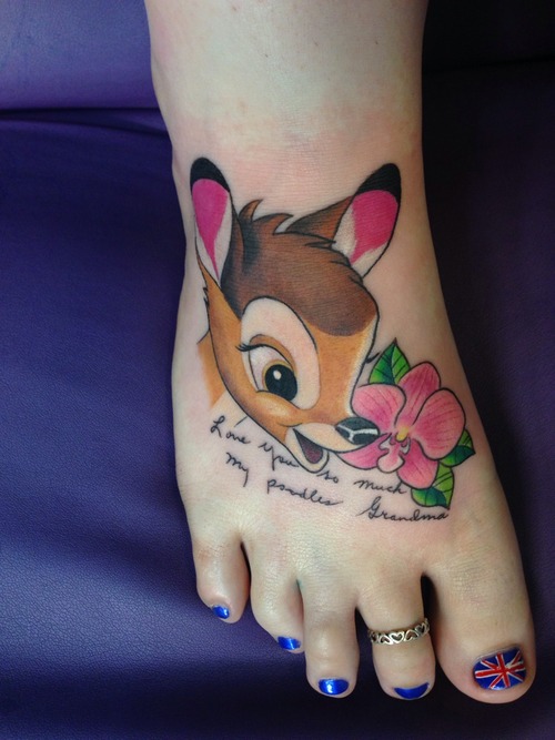 Bambi Head With Flower Tattoo On Girl Foot