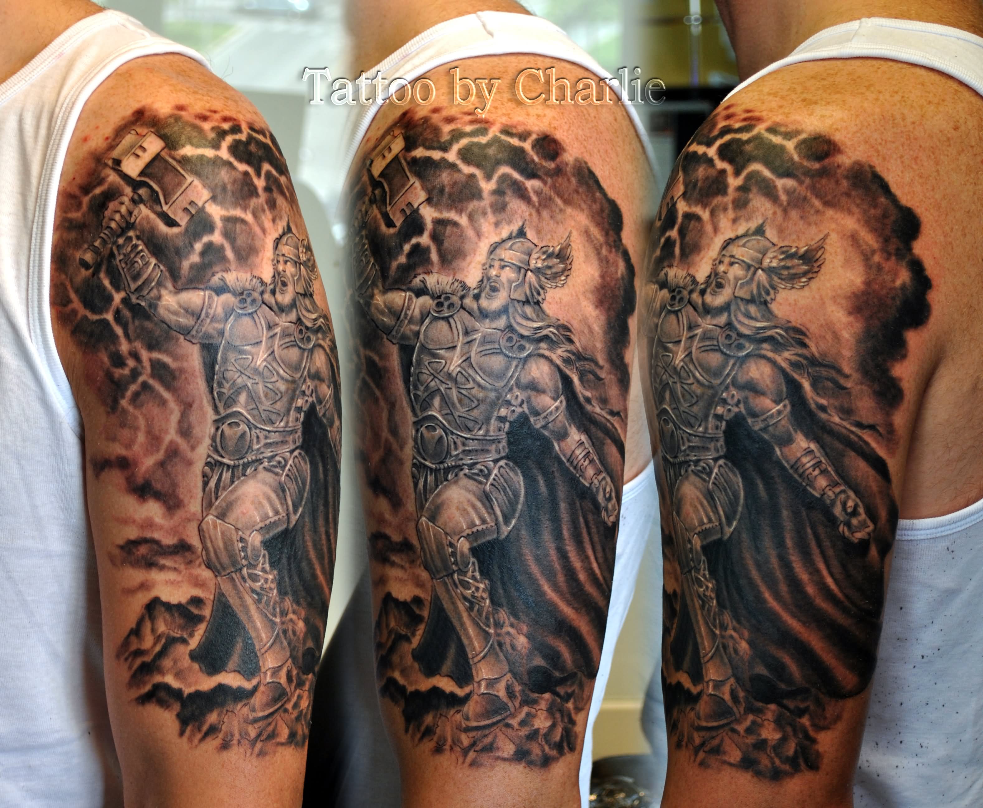 Black And Grey Thor Tattoo On Man Left Half Sleeve By Charlie
