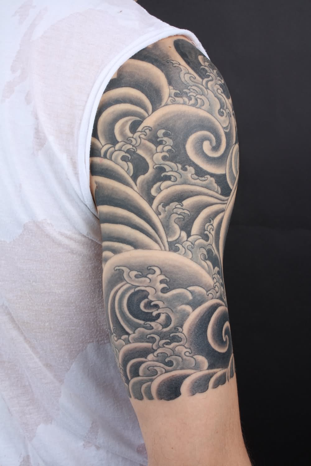 Black And Grey Waves Tattoo On Right Half Sleeve By Yoni Zilber