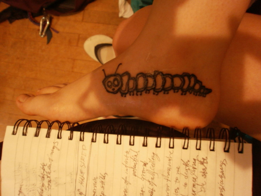 Black Caterpillar Tattoo On Heel By Alice Korvin