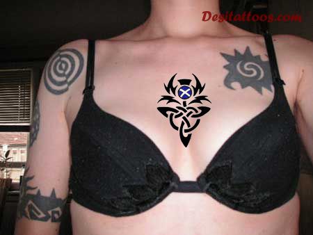 Black Celtic Thistle Tattoo On Girl Chest