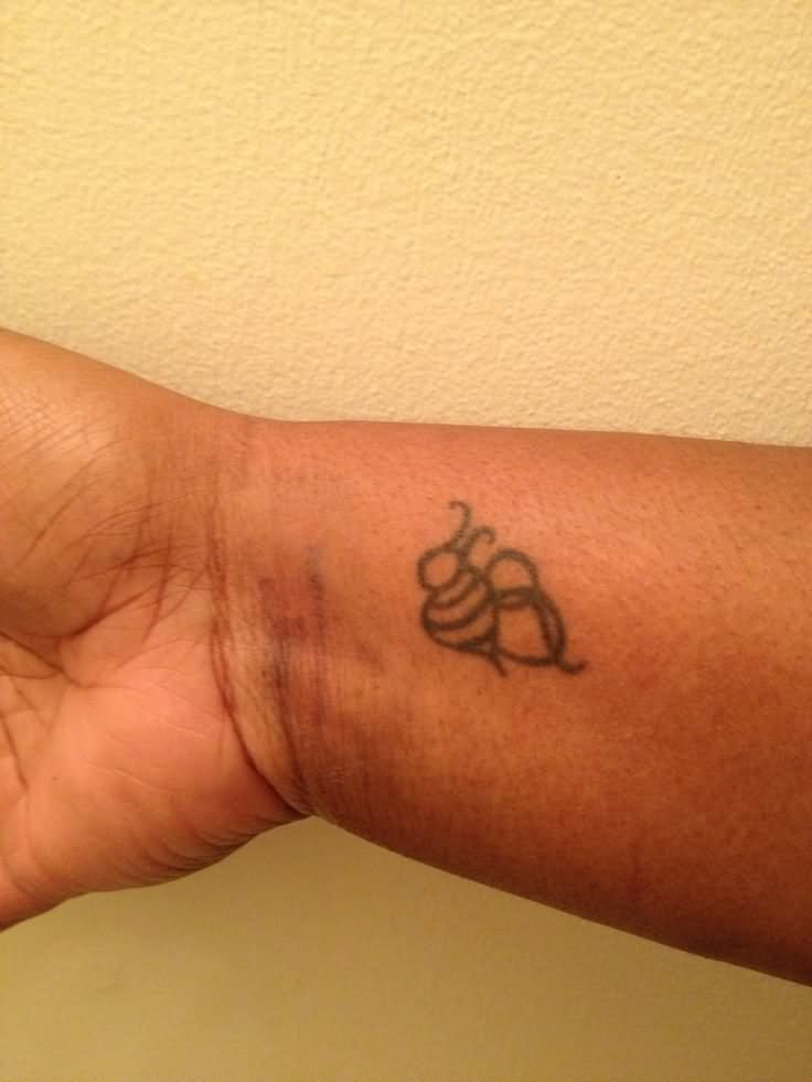Black Outline Bumblebee Tattoo On Wrist