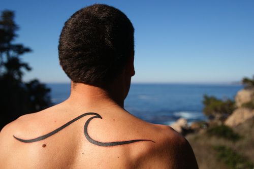 Black Outline Wave Tattoo On Man Upper Back