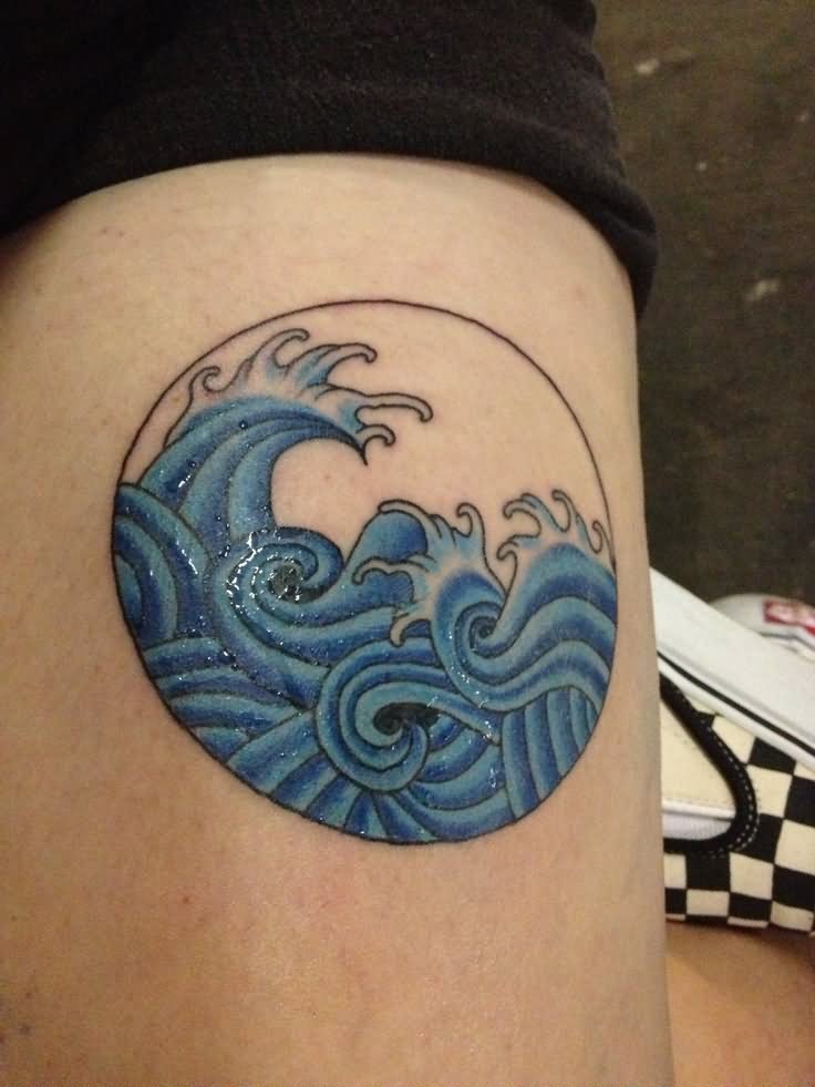 Blue Ink Wave In Circle Frame Tattoo Design