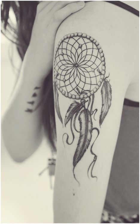 Girl Showing Her Dreamcatcher Tattoo On Left Arm