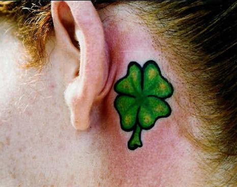 Green Four Leaf Tattoo On Behind The Ear