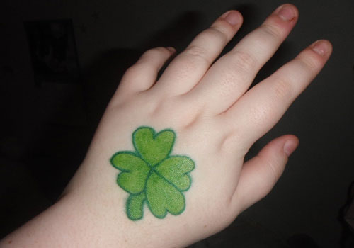 Green Four Leaf Tattoo On Hand