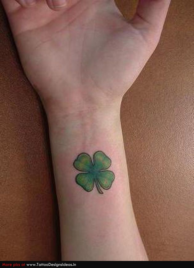 Green Ink Four Leaf Tattoo On Wrist