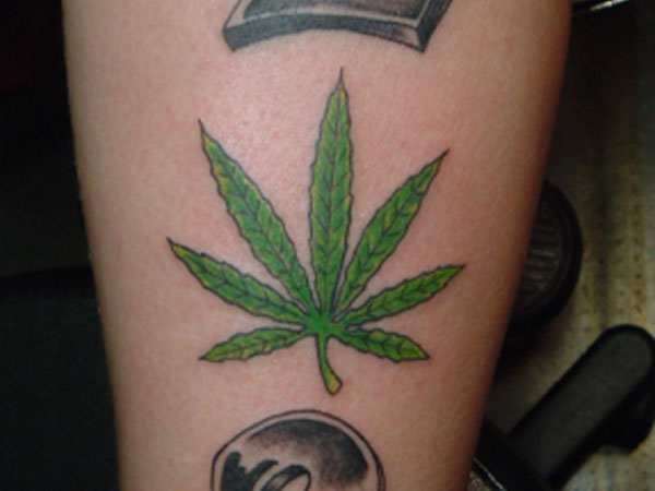 Green Leaf Marijuana Tattoo On Leg