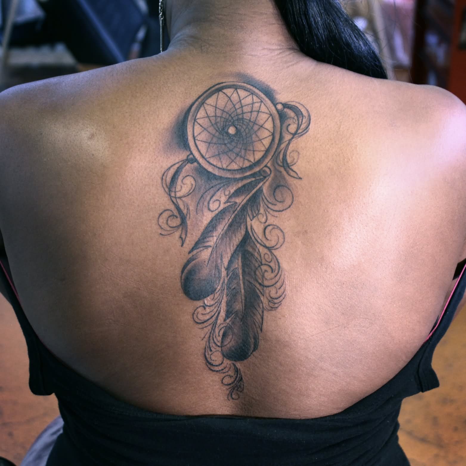 Grey Dreamcatcher Tattoo On Girl Back Body