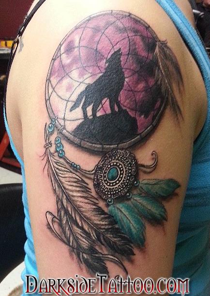 Howling Wolf In Dreamcatcher Tattoo On Arm