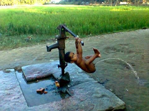 Indian Kid Pumping Water Funny Picture