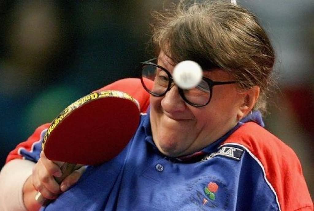 Lady Playing Table Tennis Making Funny Face