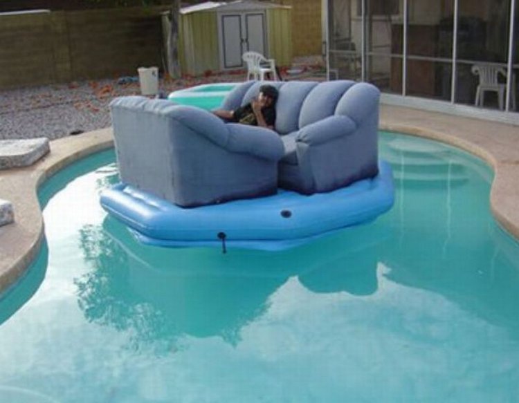 Man With Sofa In Water Funny Picture
