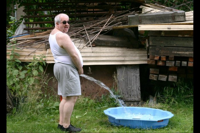 Old Man Peeing Water In Tub Funny Picture