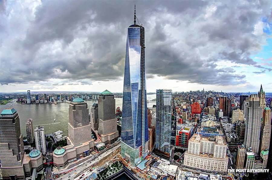 One World Trade Center and New York City on a cloudy day