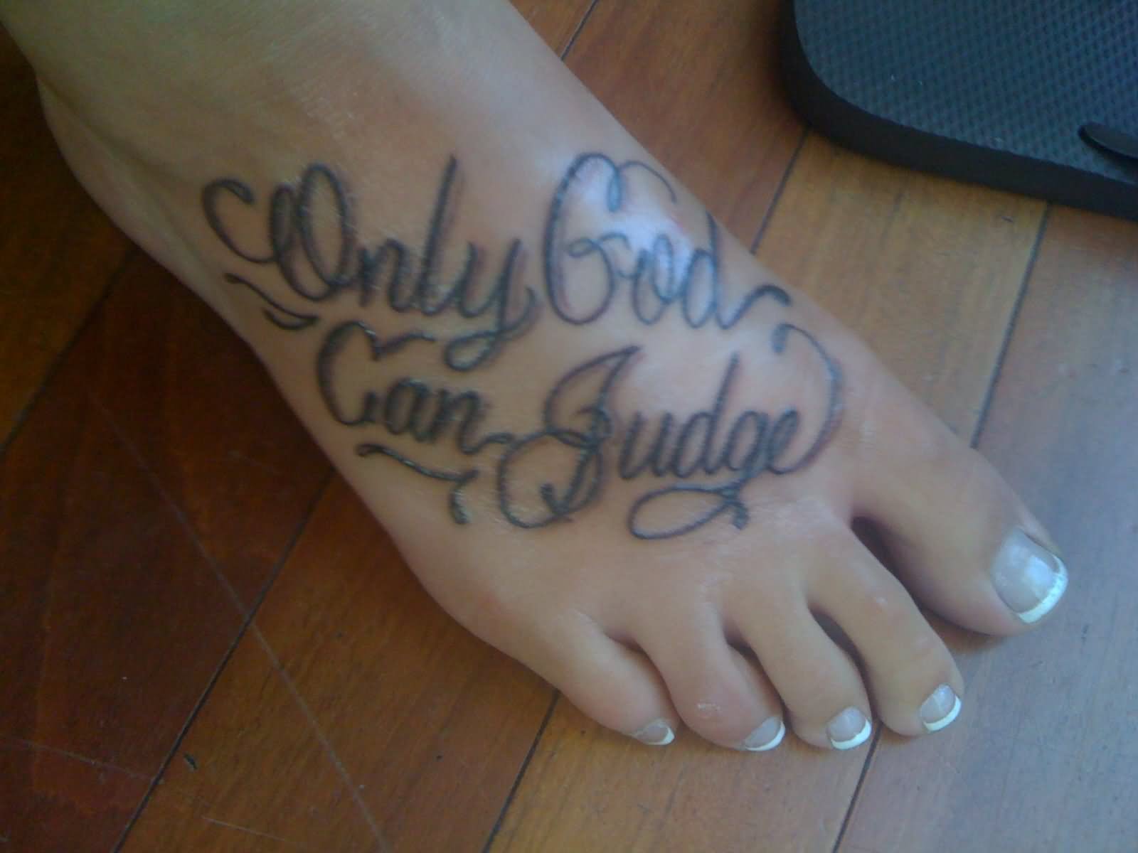 Only God Can Judge Bible Quote Tattoo On Girl Foot