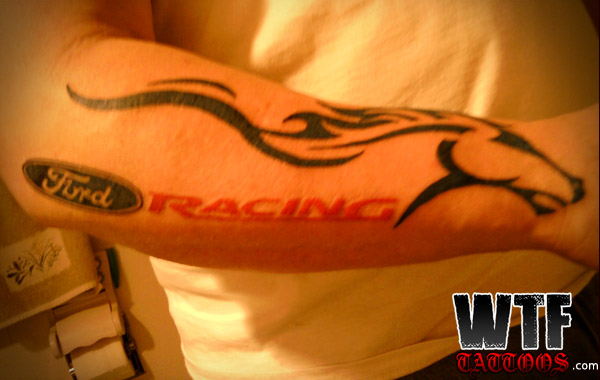 Racing - Ford Logo With Mustang Head Tattoo On Forearm