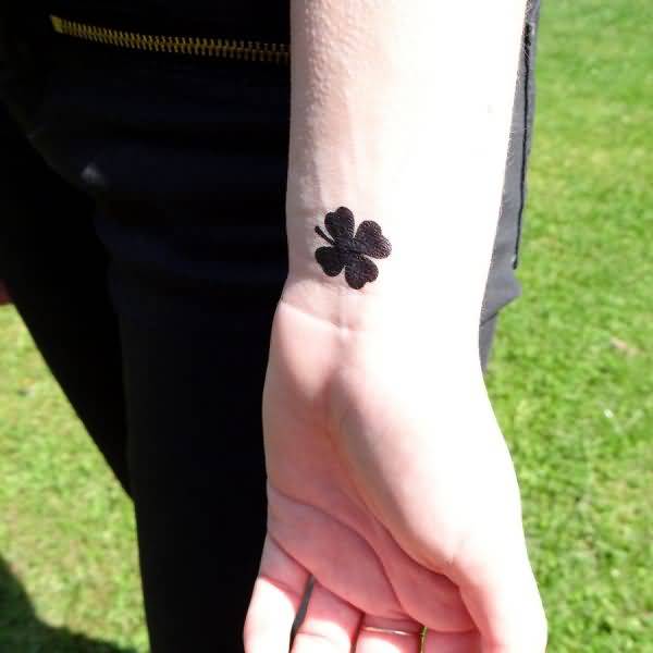 Silhouette Four Leaf Tattoo On Wrist
