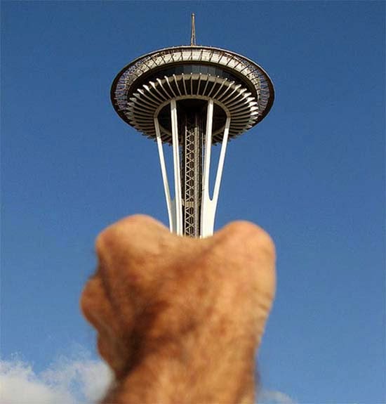Traffic Control Tower In Hand Funny Unusual Angle Picture