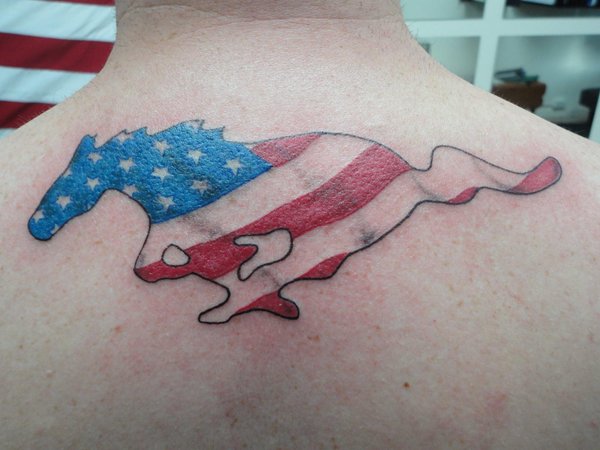 USA Flag In Mustang Tattoo On Upper Back