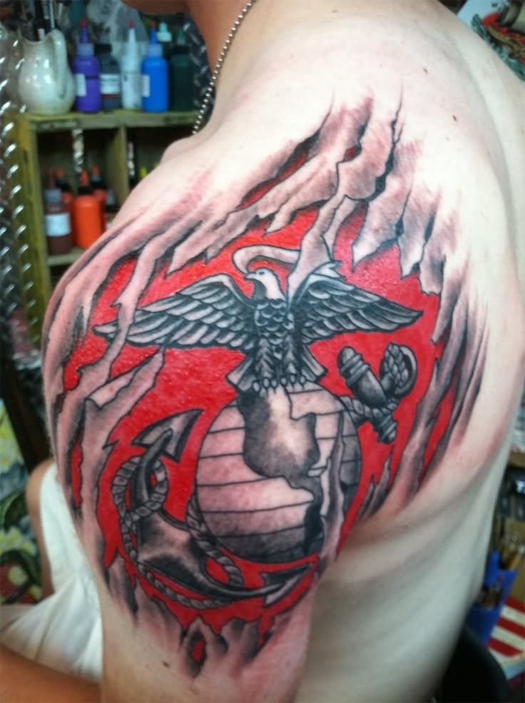 Amazing Ripped Skin Marine Logo Tattoo On Man Left Shoulder