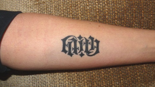 Ambigram Faith Lettering Tattoo On Forearm