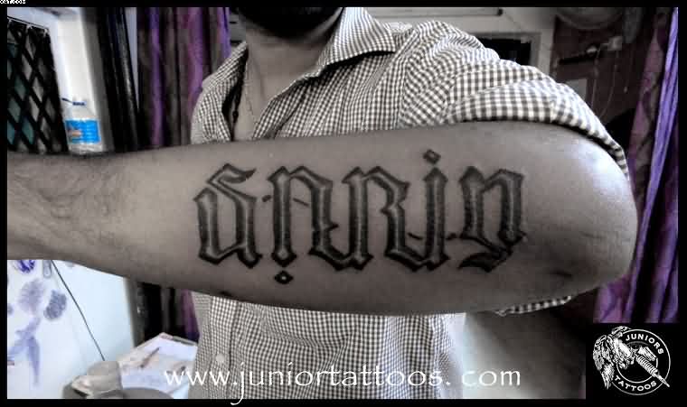 Ambigram Sarin Lettering Tattoo On Forearm