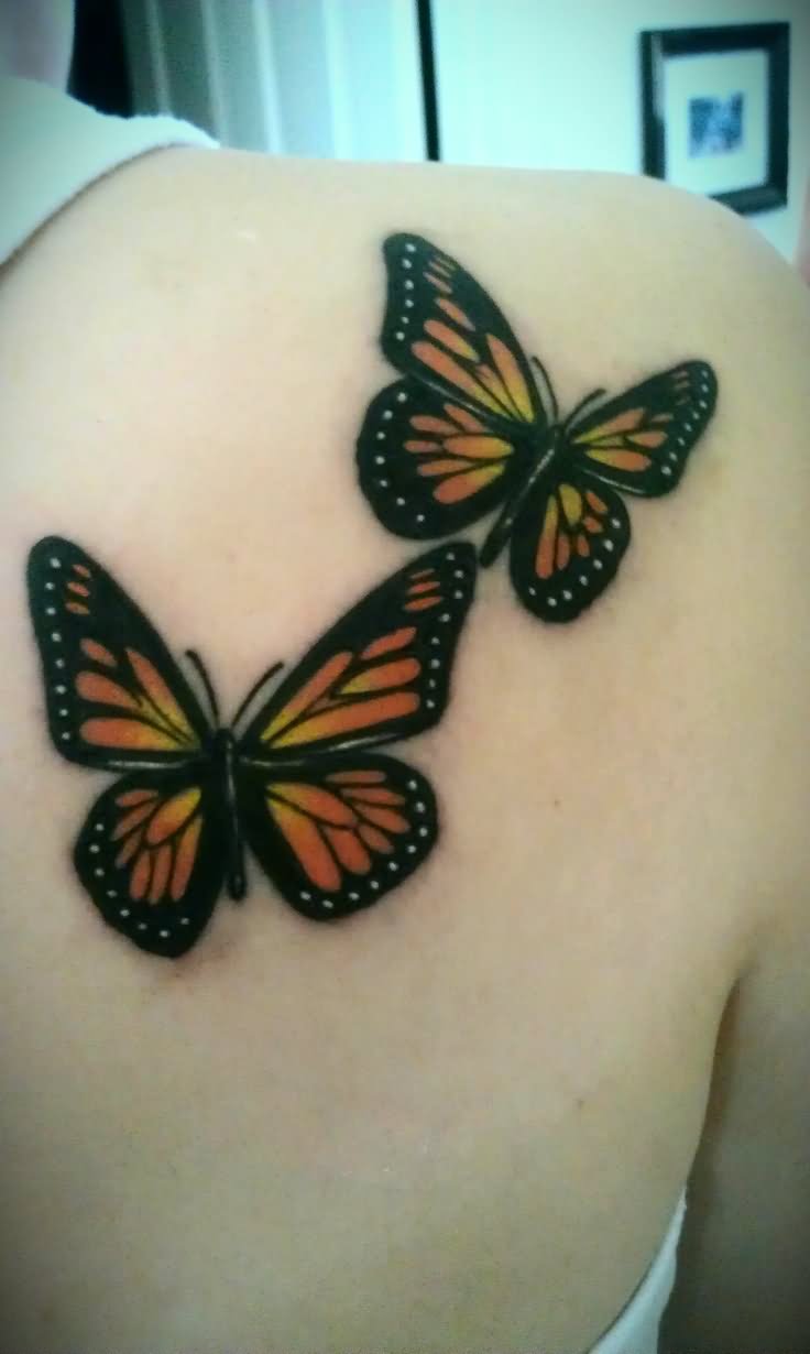 Beautiful Girl With Monarch Butterfly Tattoo On Right Back Shoulder