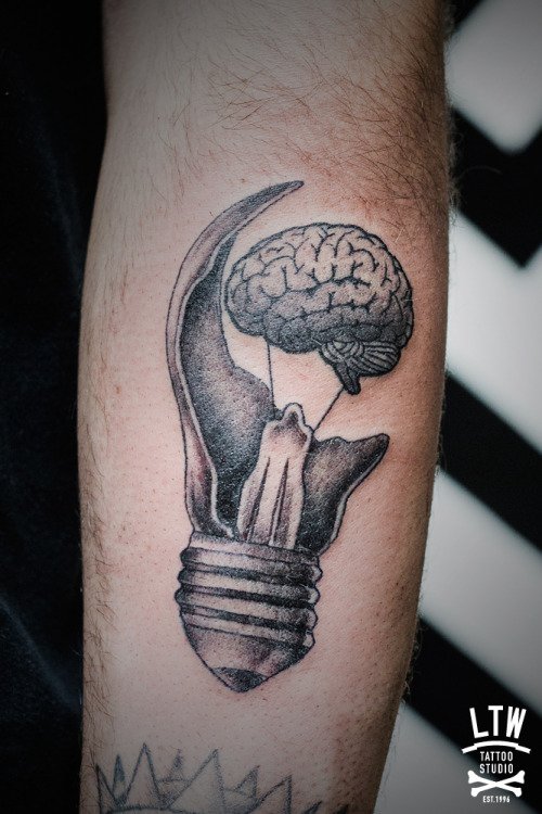 Black And Grey Broken Brain Bulb Tattoo On Arm