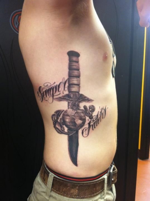 Black And Grey Knife In Marine Logo Tattoo On Man Side Rib