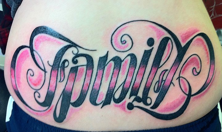 Black And Pink Ambigram Family Lettering Tattoo On Lower Back By Tiara