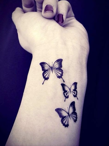 Black And White Butterfly Tattoos On Wrist