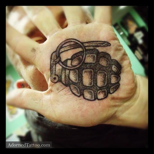 Black Ink Grenade Tattoo On Hand Palm