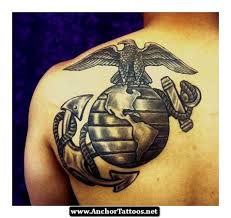 Black Ink Marine Logo Tattoo On Left Back Shoulder