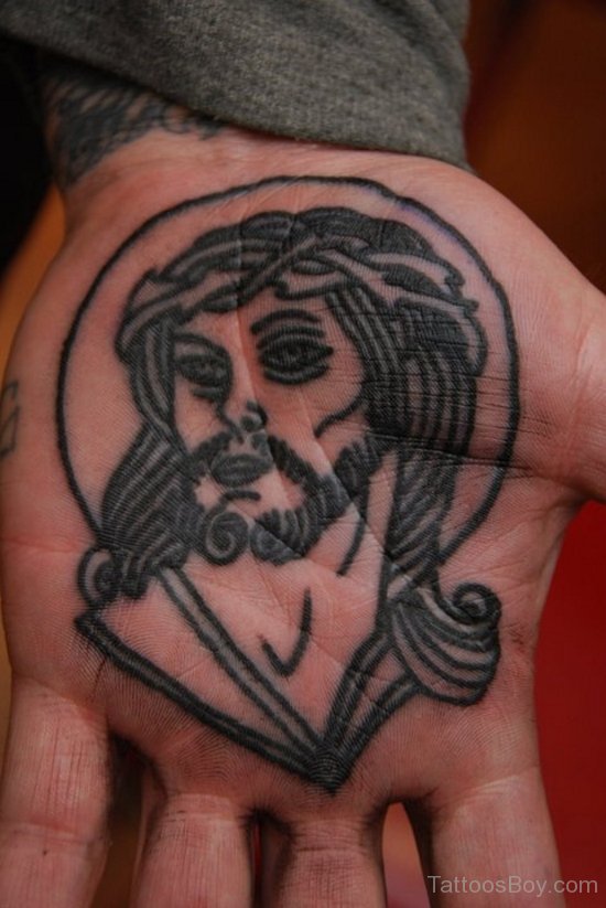 Black Jesus Head Tattoo  On Hand Palm