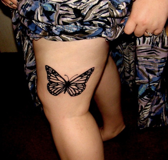 Black Outline Monarch Butterfly Tattoo On Side Thigh