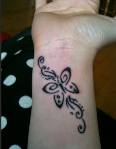 Black Tribal Butterfly Tattoo On Wrist