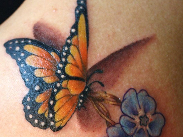 Blue Flower And Monarch Butterfly Tattoo