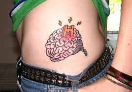 Brain With H Letter Tattoo On Side Rib