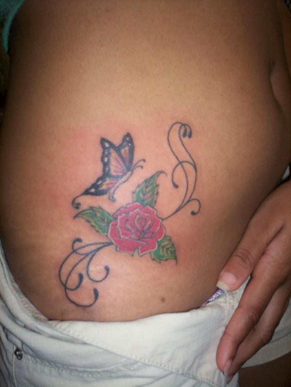 Butterfly With Red Rose Tattoo On Hip