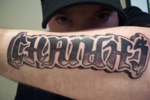 Changes Ambigram Tattoo On Left Arm