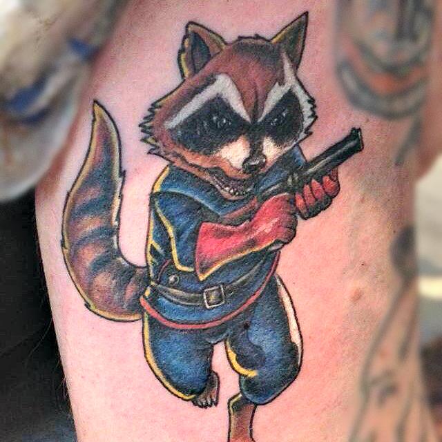 Colorful Gangster Raccoon With Gun Tattoo Design