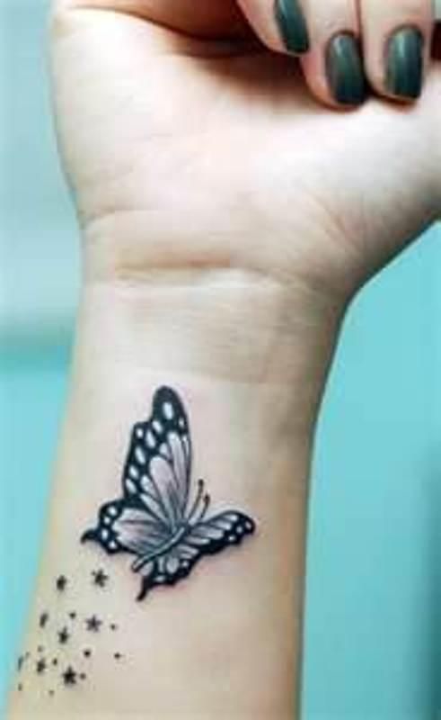 Cute Flying Butterfly Tattoo On Wrist