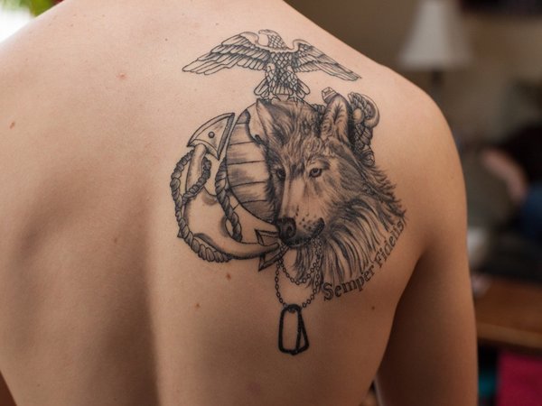 Dog Head With Marine Logo Tattoo On Man Right Back Shoulder