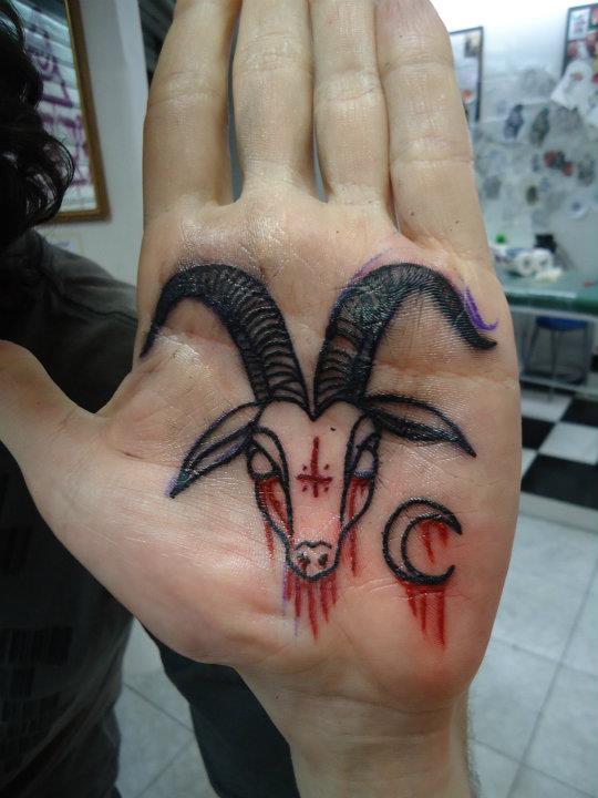 Goat Head With Half Moon Tattoo On Hand Palm