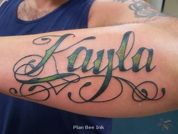 Green Ink Ambigram Kayla Lettering Tattoo On Forearm